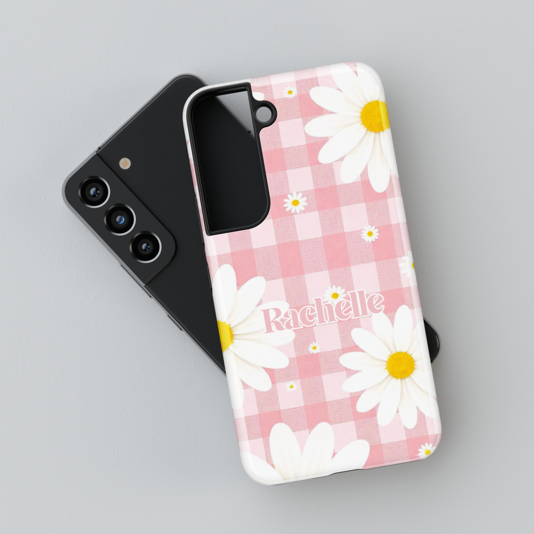 Pink gingham daisy Samsung Galaxy phone case with personalized name. Cute and aesthetic protective cover for Galaxy S25 Ultra, S24 FE, S23, and more.