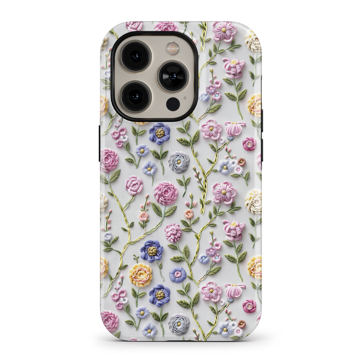 Elegant floral phone case featuring delicate flower and leaf designs in black and gold. Provides a protective, tough casing for iPhone SE, iPhone 14 Pro, and iPhone 15 MagSafe. Ideal for women seeking a stylish and nature-inspired look.