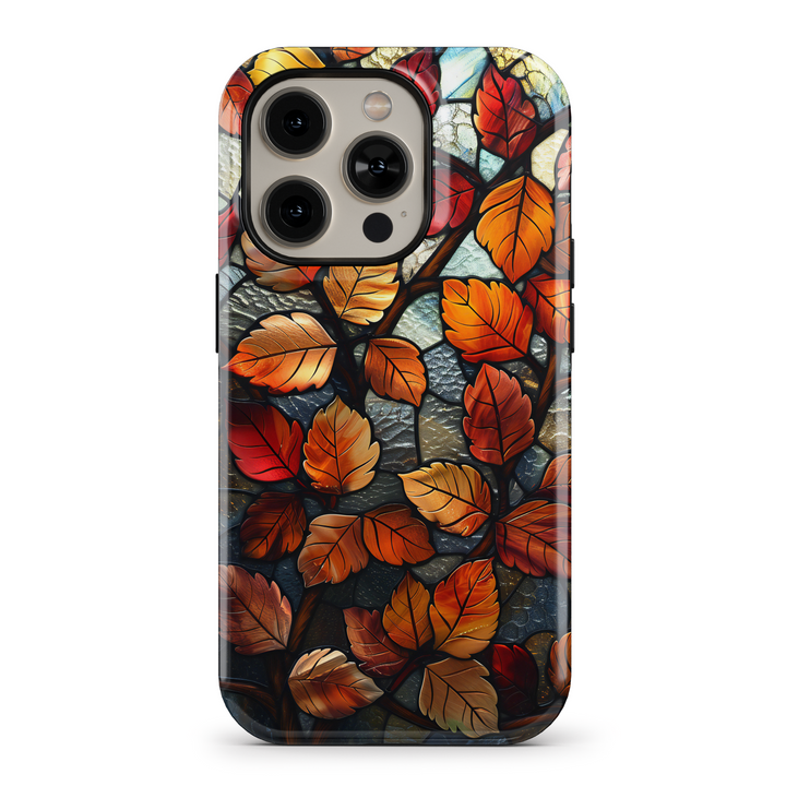 Elegant stained glass floral phone case with intricate flower and leaf patterns in vibrant colors. Offers a protective, tough casing for iPhone SE, iPhone 14 Pro, and iPhone 15 MagSafe. Perfect for women looking for a stylish, nature-inspired design with an artistic touch.