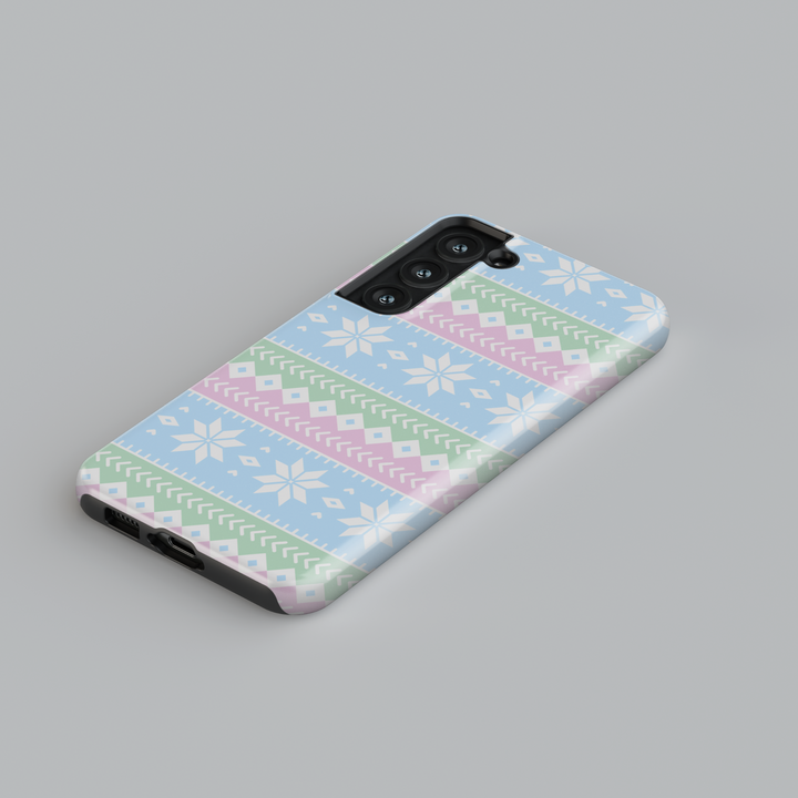 Winter-themed MagSafe iPhone 16 Pro phone case featuring a Nordic Christmas design with a charming gingerbread house. Perfect holiday phone case and thoughtful gift for her, offering festive style and durable protection for the season.