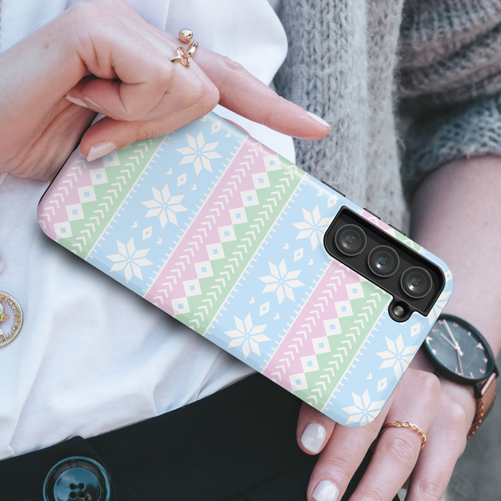 Winter-themed MagSafe iPhone 16 Pro phone case featuring a Nordic Christmas design with a charming gingerbread house. Perfect holiday phone case and thoughtful gift for her, offering festive style and durable protection for the season.