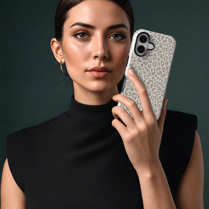 Winter-themed MagSafe iPhone 16 Pro phone case featuring a chic leopard print design. Perfect holiday phone case and thoughtful gift for her, combining stylish flair with durable protection for the season