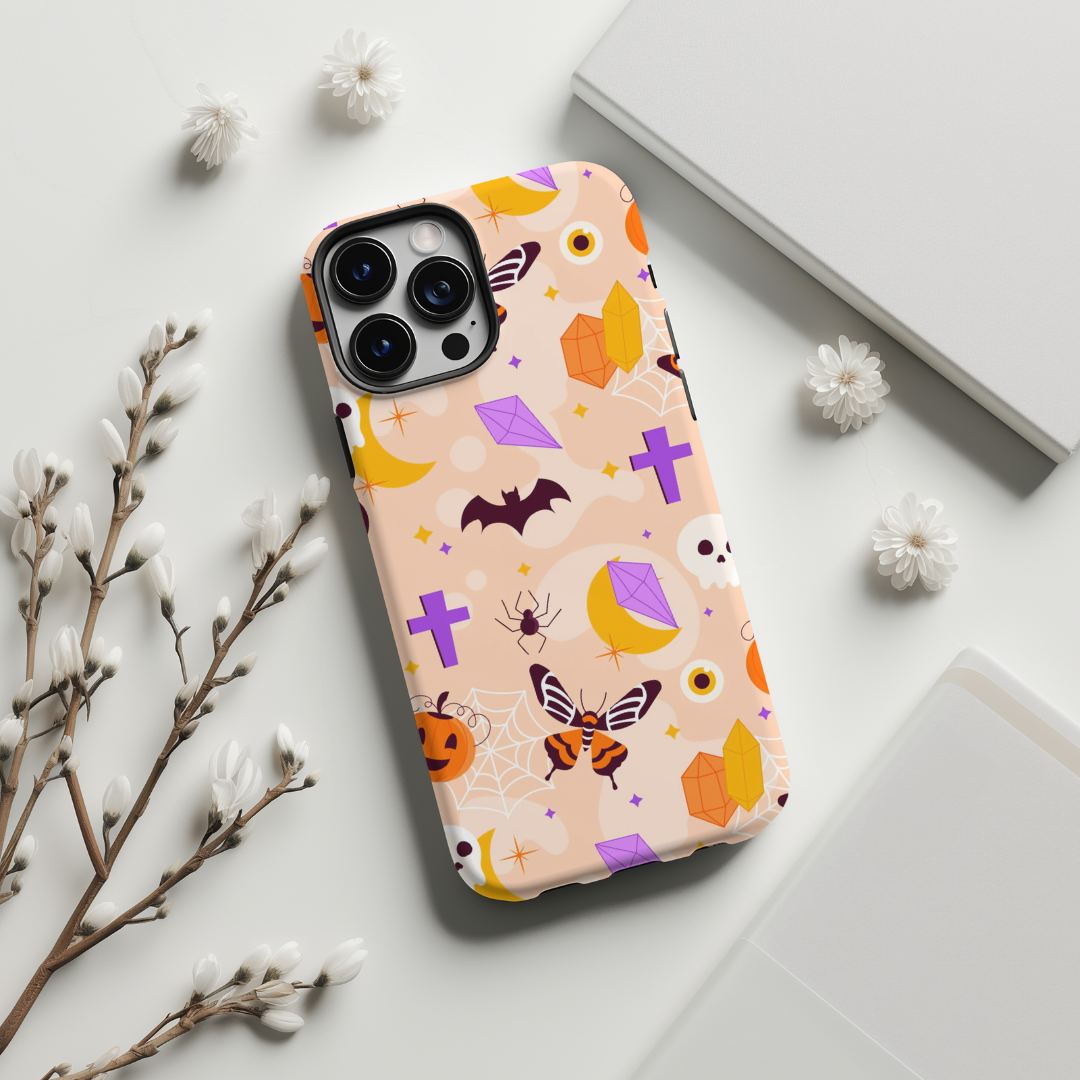 Protect your phone in style this fall with our Halloween-themed cases, including options for Pixel 8, Pixel 8 Pro, iPhone SE, iPhone 14 MagSafe, iPhone 15 MagSafe, and Samsung S24 Ultra. Perfect as a spooky gift, our goth-inspired designs like the Skull Shadows and Midnight Bones add a unique touch to your device. Don't miss our Fall iPhone cases and Halloween garland patterns!