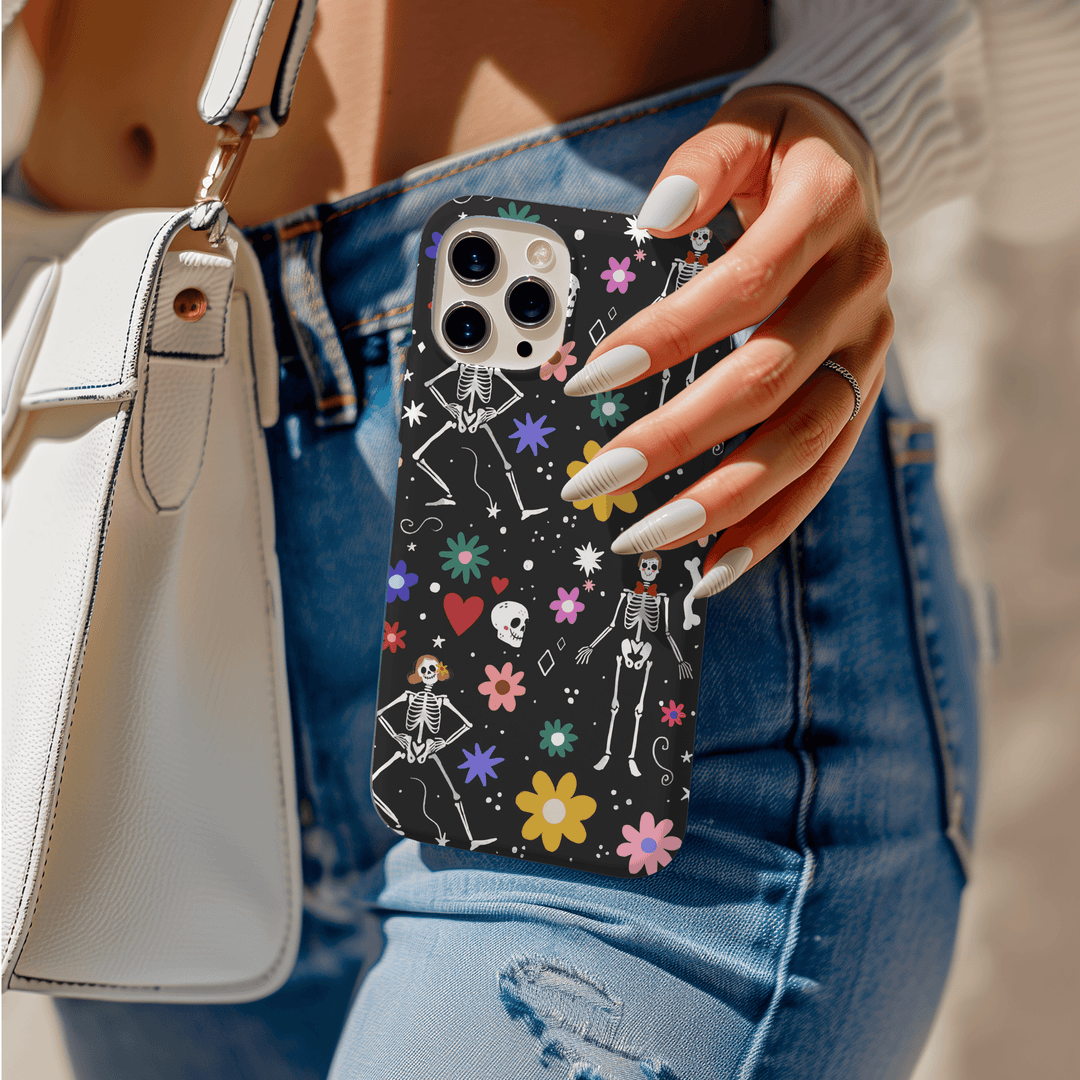 Protect your phone in style this fall with our Halloween-themed cases, including options for Pixel 8, Pixel 8 Pro, iPhone SE, iPhone 14 MagSafe, iPhone 15 MagSafe, and Samsung S24 Ultra. Perfect as a spooky gift, our goth-inspired designs like the Skull Shadows and Midnight Bones add a unique touch to your device. Don't miss our Fall iPhone cases and Halloween garland patterns!